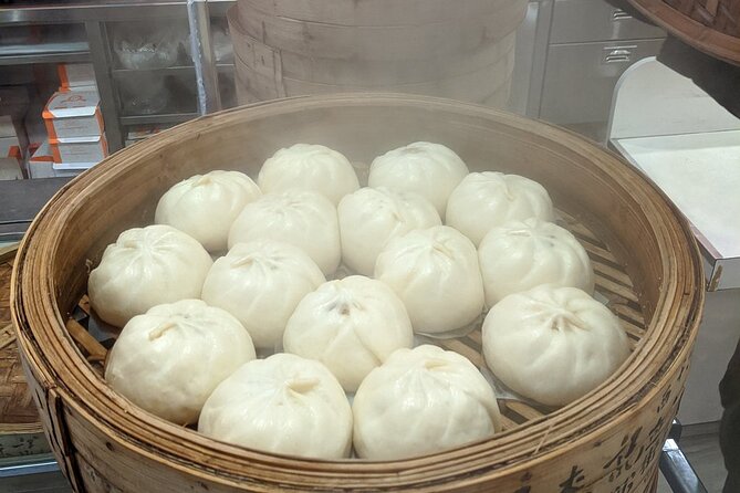 A Wok Around Chinatown: Culinary and Cultural Walking Tour Led by a Chef - Walking through Vancouver Chinatown with a local guide