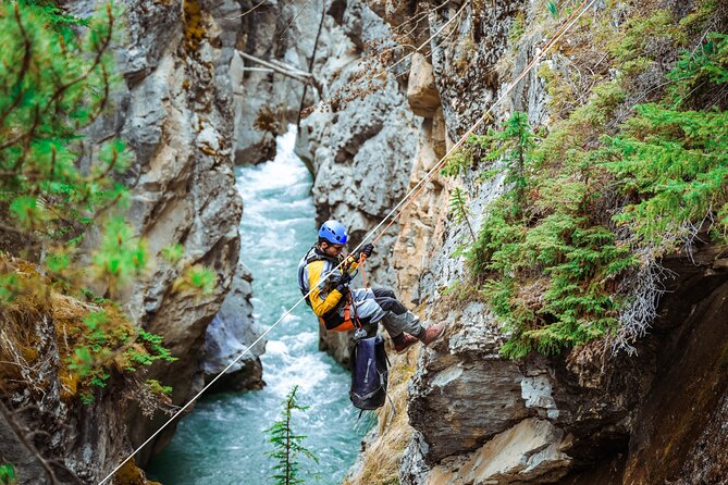 Adrenaline Aquatic Tour - Swimming through cold mountain water