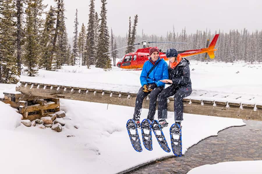 Banff/Jasper: Canadian Rockies Helicopter & Snowshoe Tour - The guided walk to a frozen waterfall