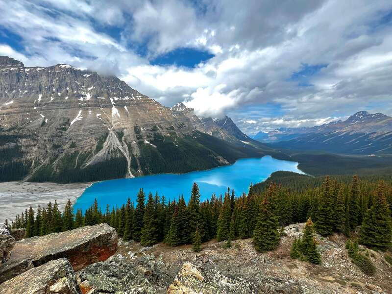 Banff - Lake Louise Moraine Lake and Icefields Parkway Tour - Bow Falls and Banff’s first famous view