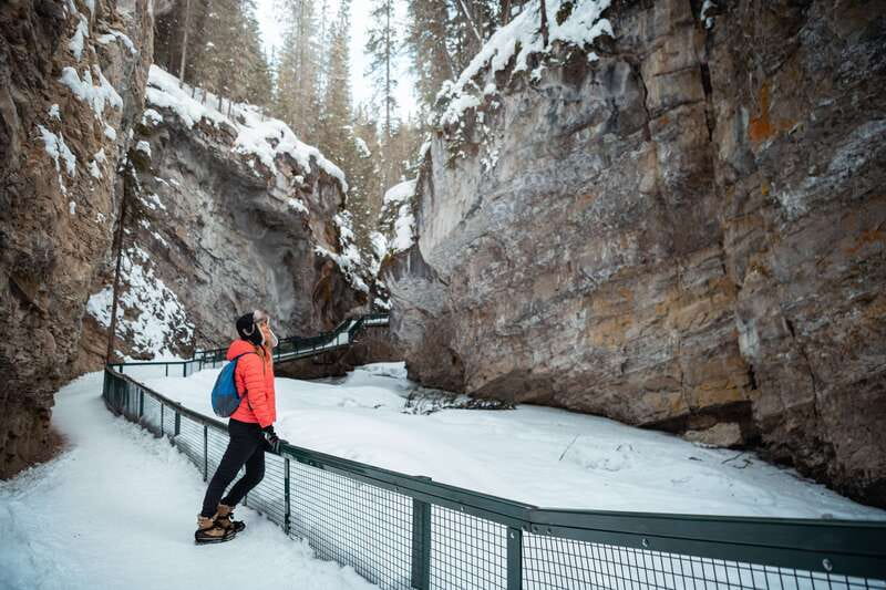 Banff: Morning or Afternoon Johnston Canyon Icewalk - The Lower Falls and its small cave viewpoint