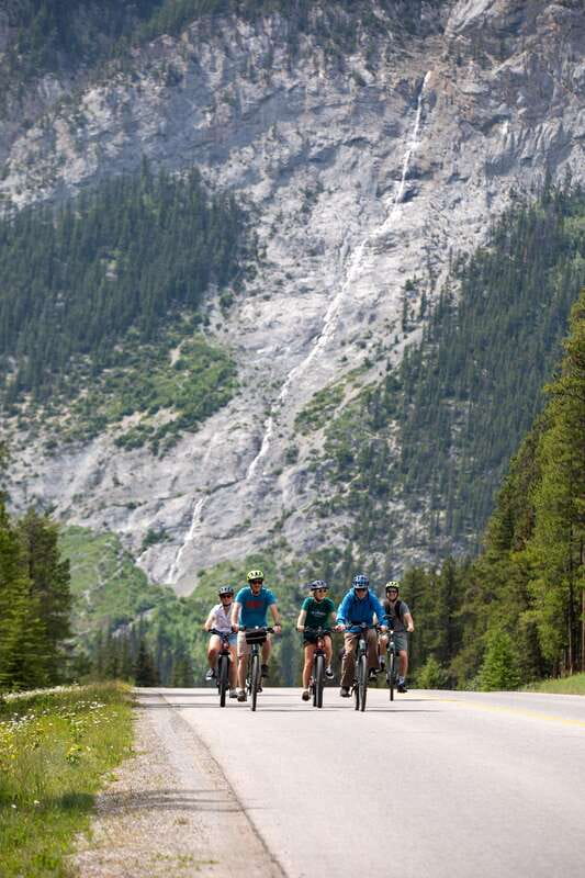 Banff: Mountain Lakeside Guided E-Bike Tour - Lake Minnewanka and the town beneath the water