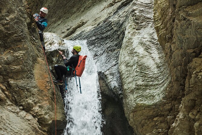 Beartooth Canyon- Half Day Canyoning Tour - Golden, BC - Three waterfall rappels through bluish rock