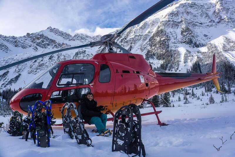 Canadian Rockies: Abraham Lake Ice Bubbles Helicopter Tour - Warming up with cocoa, fire, and marshmallows