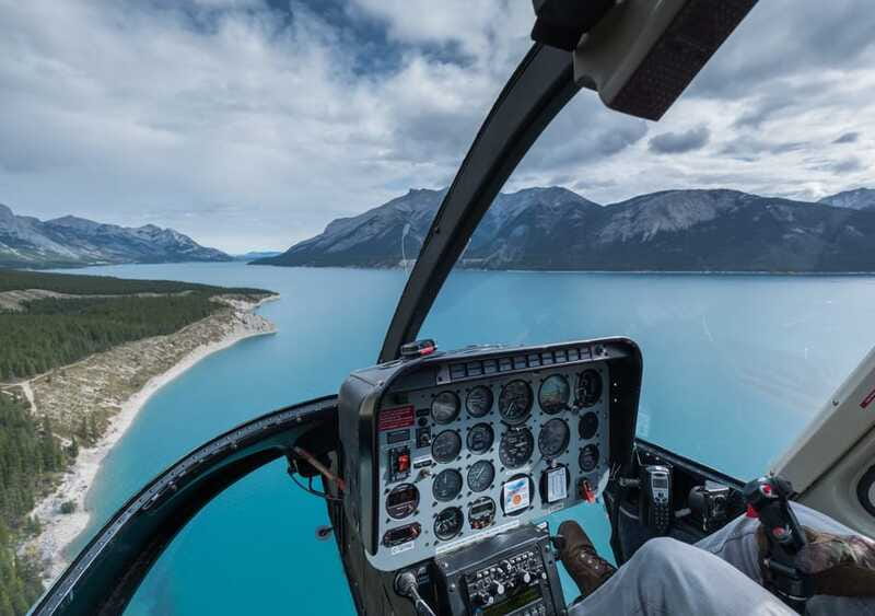 Canadian Rockies: Helicopter Flight with Exploration Hike - Returning over Abraham Lake