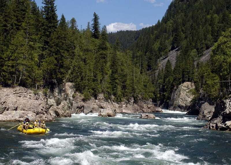 Clearwater BC Rafting with time for a waterfall Tour - Ancient lava cliffs beside the raft
