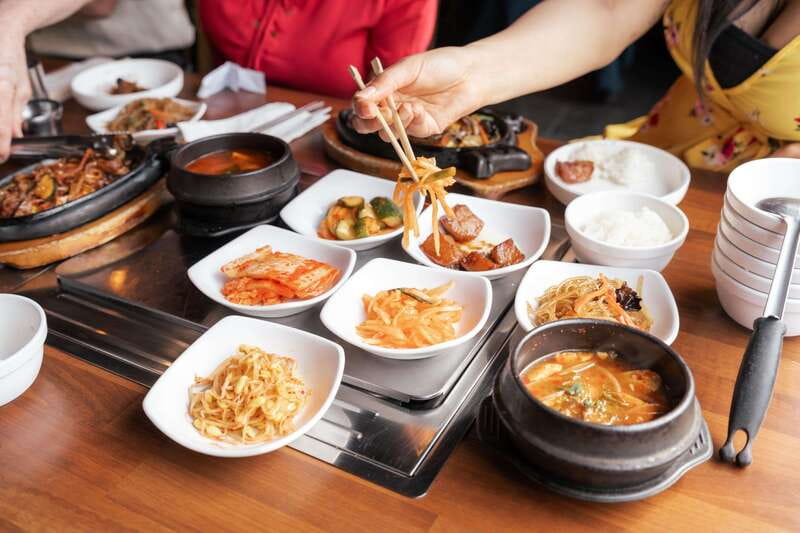 Downtown Vancouver: Asian Eats Walking Food Tour - Meeting at Kirin Chinese Restaurant