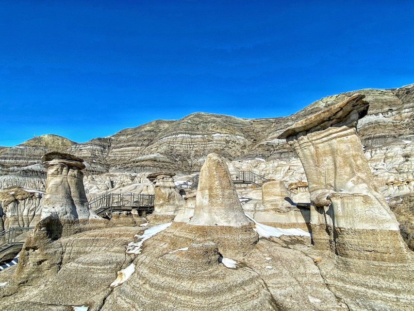 Drumheller: Bad Land & Dinosaur Museum Tour from Calgary - Meals, meeting point, and practical planning