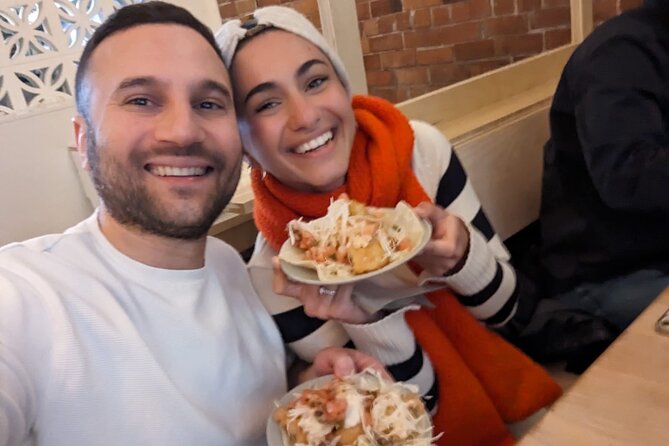 Experience Gastown Vancouver's Elite Walking Food Tour - Butter chicken poutine and a smart Canadian twist