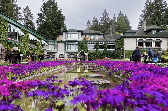 Experience Victoria and Butchart Gardens Premium Tour - Returning beside the Empress Hotel