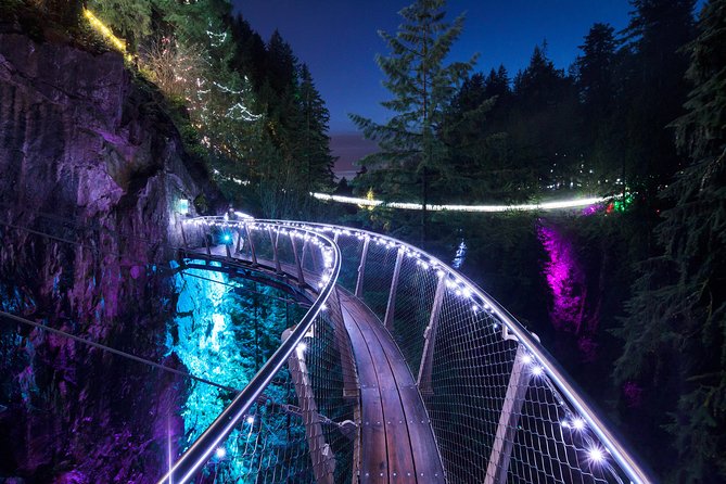 Explore Vancouver City & Capilano Suspension Bridge Canyon Lights - Capilano Suspension Bridge Park after sunset