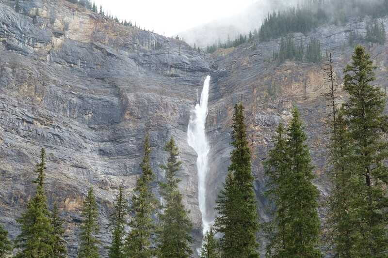 From Banff: Mountains, Lakes, and Waterfalls Full-Day Tour - The bus, guide, and pace of the day