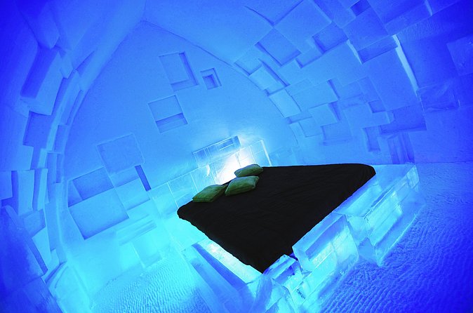 From Quebec city: Ice Hotel Visit and Transportation - Ice sculptures, themed rooms, and a maple whiskey stop