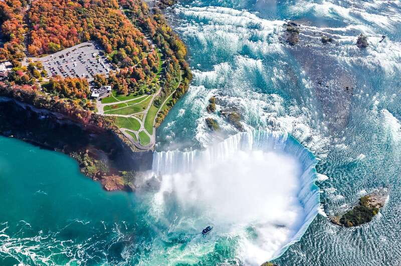 From Toronto: Niagara Falls Bus Tour with Boat Cruise - Free time around Clifton Hill and the falls