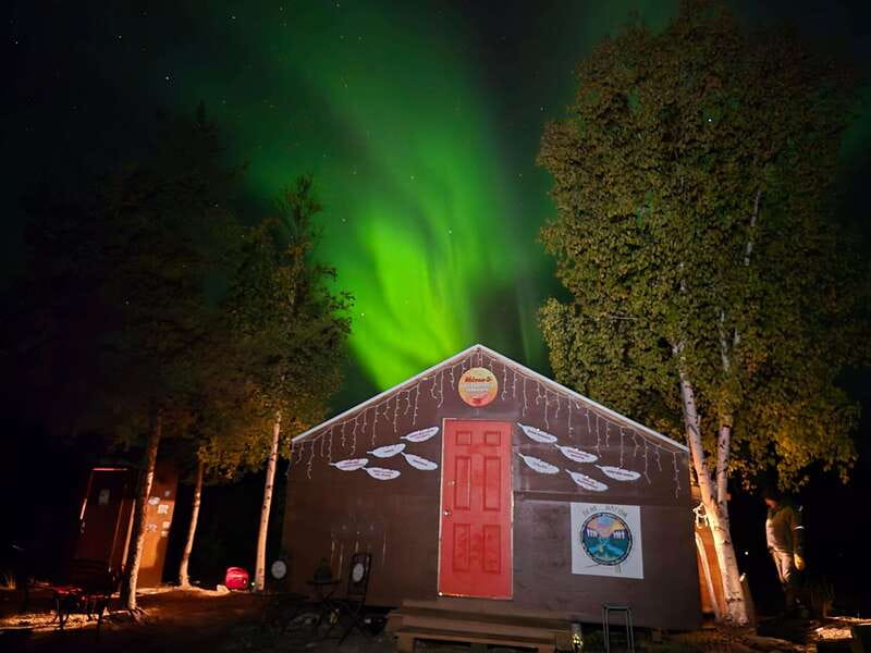 From Yellowknife: Aurora Borealis Tour with Cozy Cabin Base - Fish chowder, bannock, and hot drinks