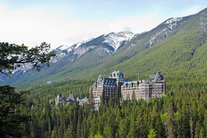 Guided Tour to Banff Highlights & Wildlife With Gondola Admission - Surprise Corner frames the Fairmont Banff Springs