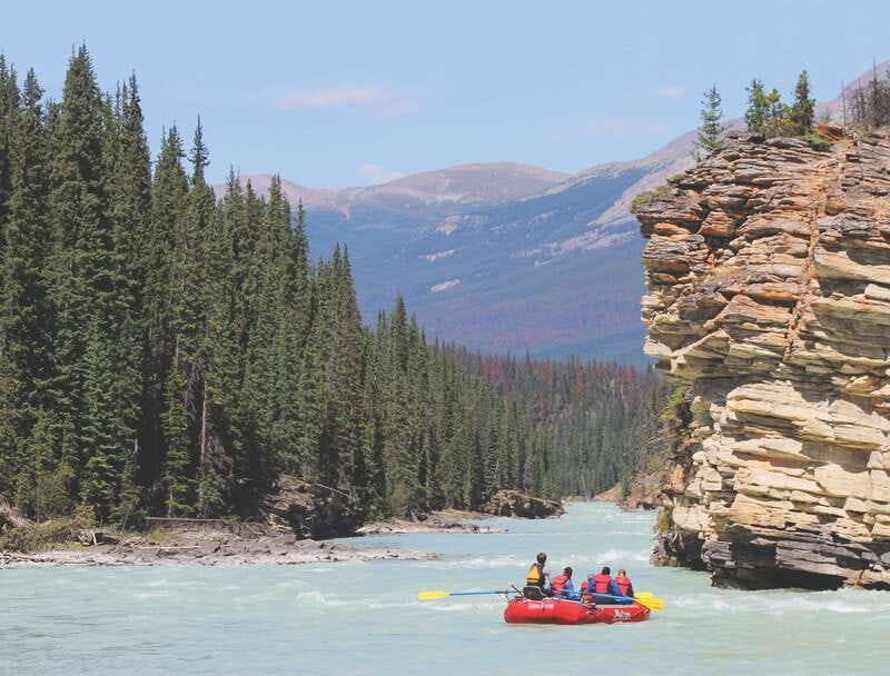 Jasper: Canyon Run Family Whitewater Rafting - Getting suited up beside the river