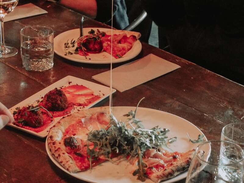 Kelowna: Walking Food Tour with 7 Tastings and 4 Drinks - Dolphins Kelowna, The Bear, and downtown details