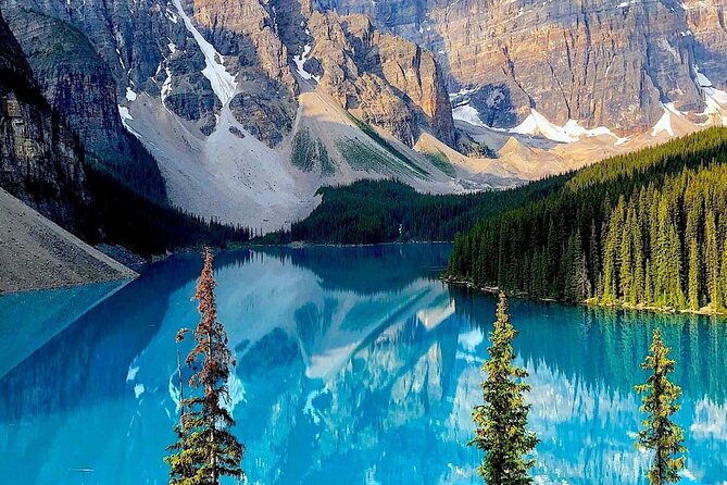 Lake Louise, Moraine, Emerald, Johnston Canyon and Banff Town - Emerald Lake starts the day with strong color