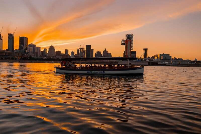 Montreal: Electric Boat Cruise with Onboard Drinks - Silo #5 and Habitat 67 from the water