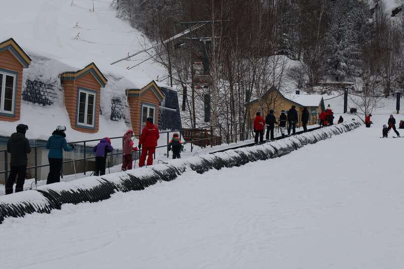 Montreal: Guided Skiing in Quebec Forests - Getting fitted with skis, a helmet, and winter gear