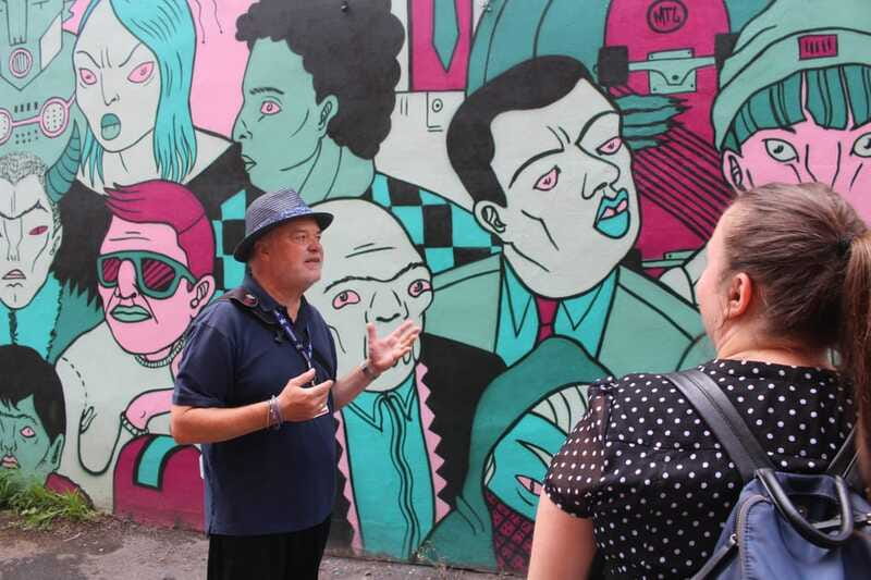 Montreal: Guided Walking Tour of Montreal's Murals - Heading south to the Entertainment District