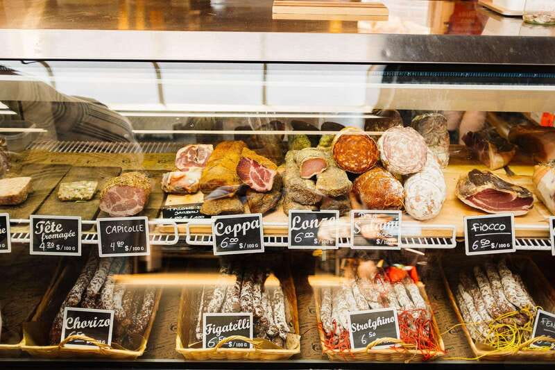 Montreal: Jean-Talon Market & Beyond Locally Owned Food Tour - Walking through Little Italy
