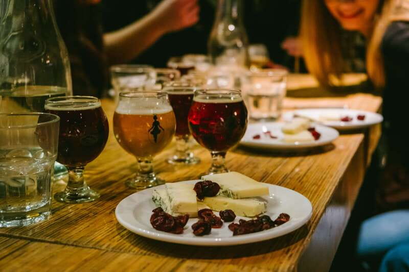 Montreal Old Port: Craft Brewery and Beer Tasting Tour - Three beers and a pretzel at 3 Brasseurs St-Paul