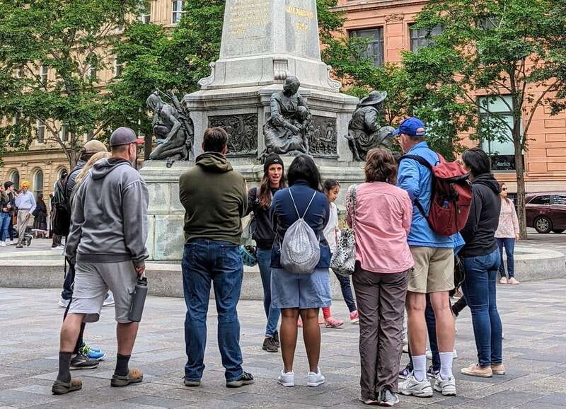 Montreal: Top Rated Small Group Old Montreal Walking Tour - Place d’Armes and the details above street level