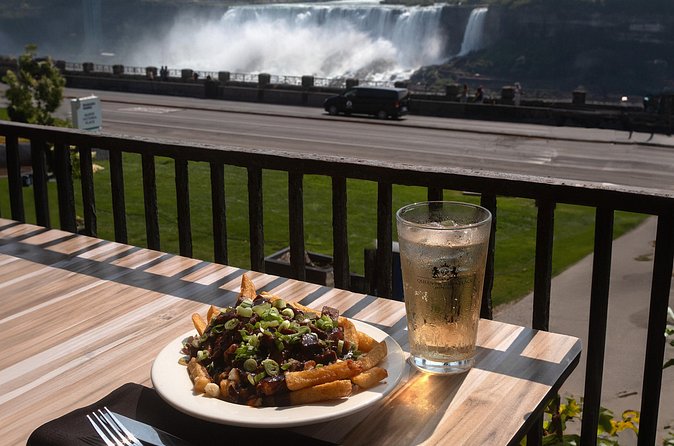 Niagara Falls All Canadian Food Walking Tour - Queen Victoria Place and Montreal smoked meat poutine
