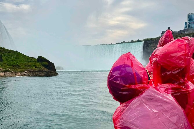 Niagara Falls Day Tour, Boat Cruise and Journey Behind the Falls - Niagara Whirlpool and Floral Clock photo stops