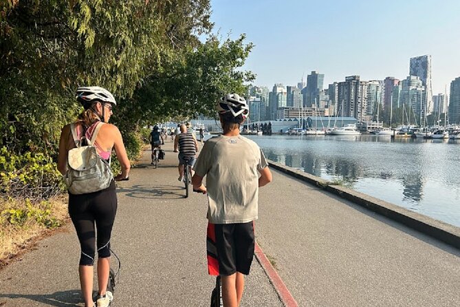 Stanley Park Seawall E-scooter Rental with Self Guided map - Coal Harbour brings in the North Shore mountains