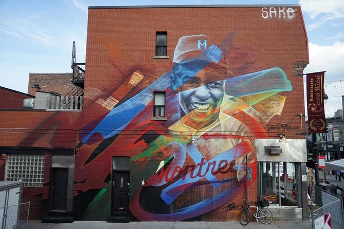 The Original Montreal Mural Arts Tour by Spade & Palacio - Saint-Laurent Boulevard and the mural corridor