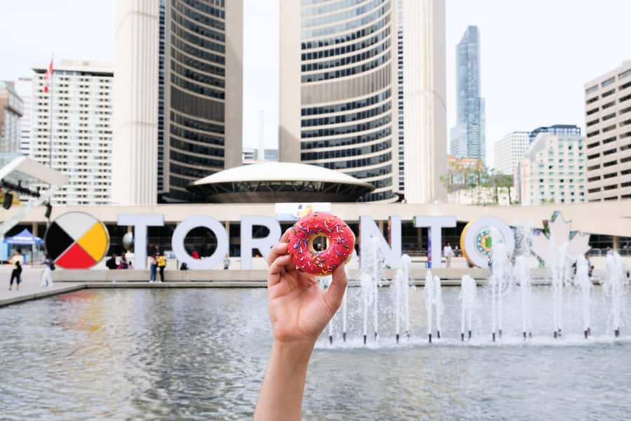 Toronto: Taste Toronto's Best Donuts & Sweet Treats Tour - Through Alexandra Park toward Kensington Market