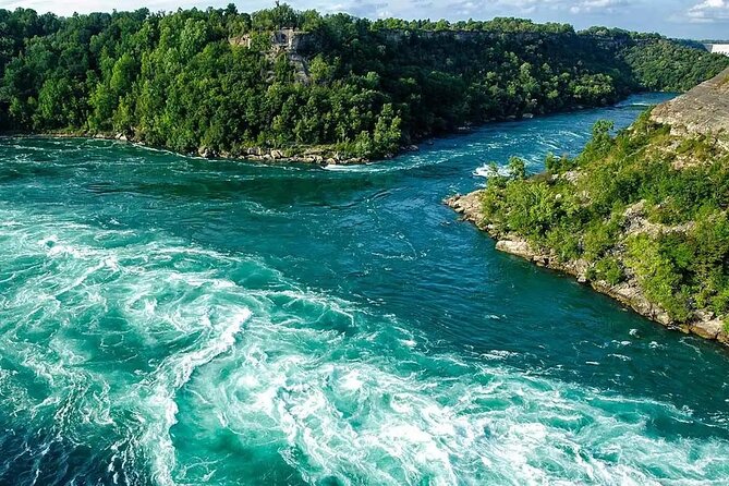 Toronto to Niagara Falls Tour with Skywheel & Fallsview Dinner - Table Rock and Horseshoe Falls: the day’s essential stop