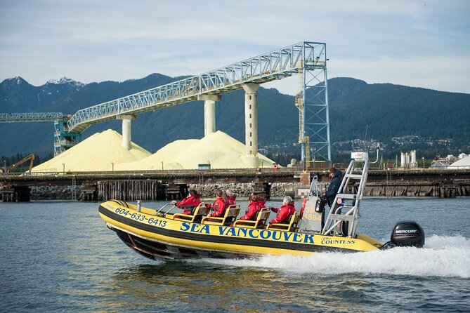 Vancouver City and Nature Waterfront Sightseeing Boat Tour - Passing the Lions Gate Bridge toward West Vancouver