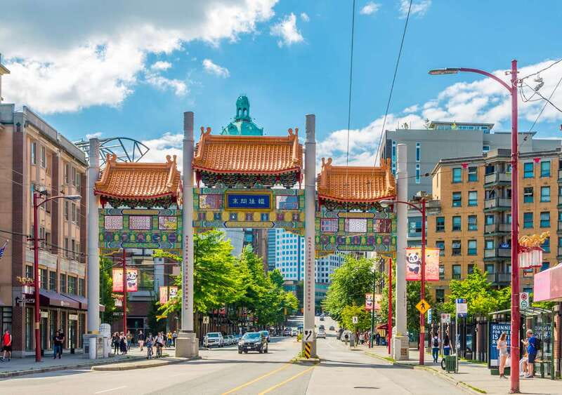 Vancouver: City Highlights Tour with Hotel Transfers - English Bay and the waterfront from the road
