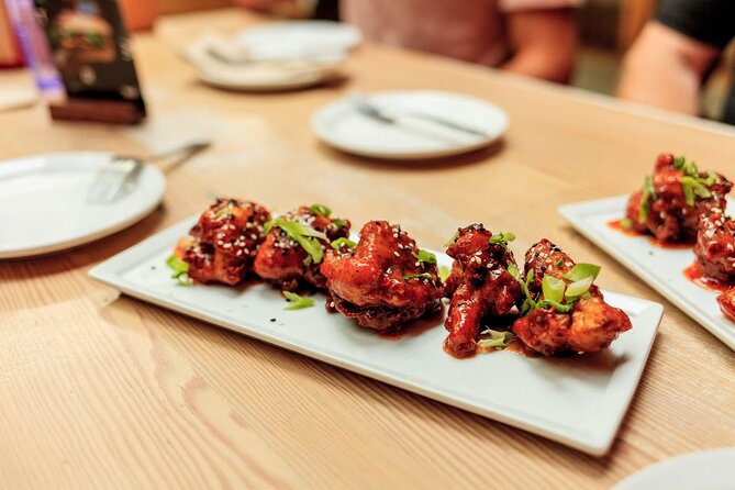 Vancouver Food Tour with 6 Tastings of Sushi, Chocolate, and more - Meeting Gastown’s early story at Maple Tree Squares