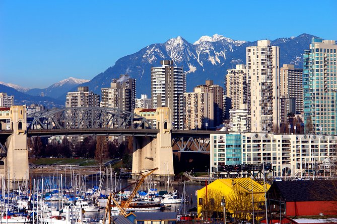 Vancouver Tour: Stanley Park, Granville Island & Capilano Bridge - Canada Place and Robson Street set the city scene